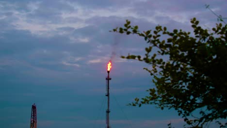 Tall-chimney-flares-gas-resulting-in-emissions-and-climate-change