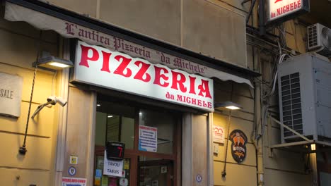 L'Antica-Pizzeria-da-Michele-Signage-At-The-Entrance---Pizza-Restaurant-In-Naples,-Italy---Close-Up