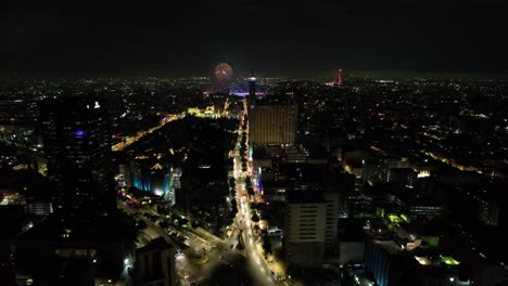 drone-shot-of-fireworks-demonstration-at-mexico-city-zocalo-during-independence-day-celebration-at-night