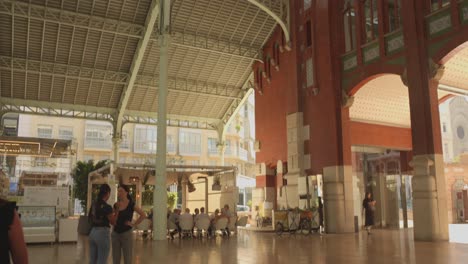 Tilt-shot-of-Colón-Market,-historic-landmark-in-Valencia,-Spain