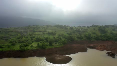 Early-morning-heading-towards-Droneside,-where-the-water-is-glistening-with-sunlight