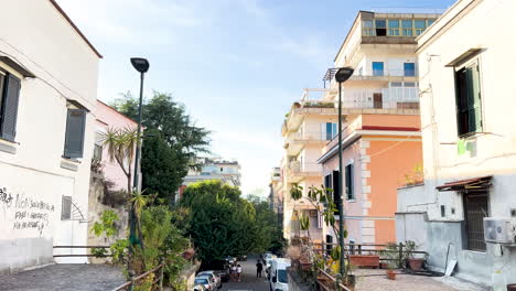 Descent-down-a-tree-lined-stairway-in-an-Italian-neighborhood---Sorrento,-inviting-exploration-of-the-quiet-urban-landscape