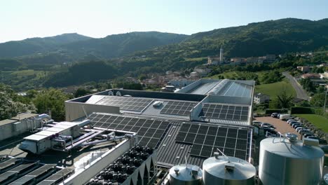 Industrial-Factory-With-Solar-Panels-Of-Renewable-Energy-On-Roof