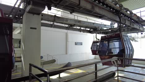 Visitors-arriving-at-and-departing-from-the-cable-car-station-serving-as-gateway-into-the-Resorts-World-Genting-luxury-complex-on-Mt