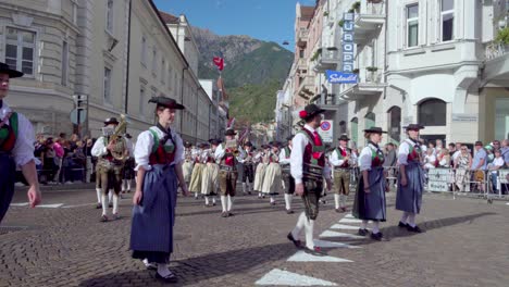 The-marching-band-of-Karneid-during-the-annual-grape-festival-in-Meran---Merano,-South-Tyrol,-Italy