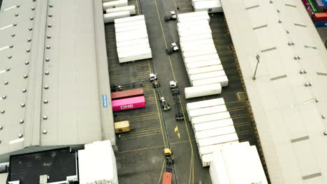 panoramic-drone-shot-of-containers-and-warehouses-at-customs