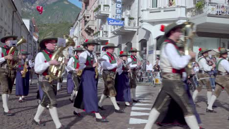 The-marching-band-of-St-Georgen-during-the-annual-Grape-Festival-of-Meran---Merano,-South-Tyrol,-Italy