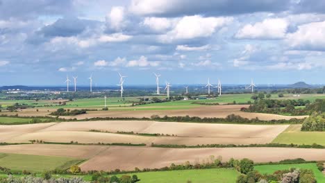 Distant-wind-farm-operating,-lovely-weather-at-Aachen-in-Netherlands