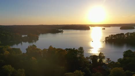 Lake-Keowee,-Seneca,-SC-Sunset-Reflecting-off-of-Gently-Rippling-Lake