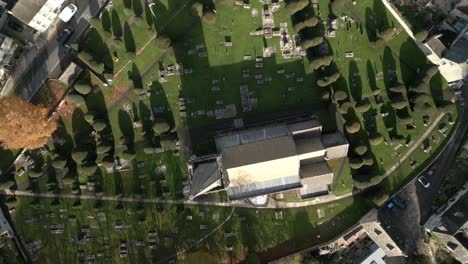 Graveyard-Birds-Eye-View-Yew-Trees-UK-Cotswold-Painswick-Aerial-Overhead-Autumn-UK-Historic