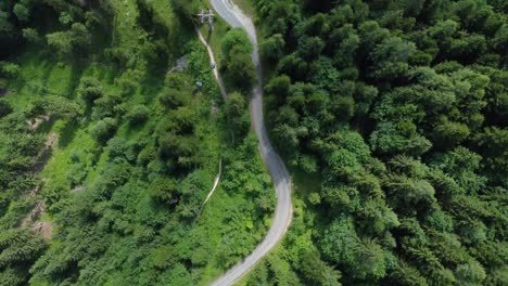 Drone-Flight-Over-Forest-Cable-Cars,-Alps,-Austria