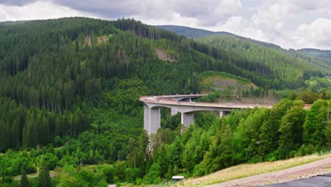 Mountain-landscape-bridge-with-cars-in-the-background
