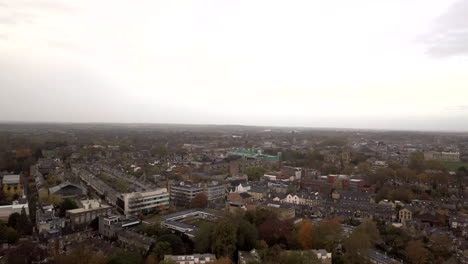 Drone-Flying-towards-Charter-House,-Cambridge-Centre,-drone,-look-from-sky,-foggy