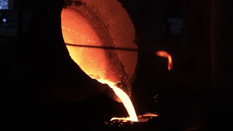 pov-shot-high-degree-Celsius-Iron-is-being-melted-and-the-bars-are-sparking