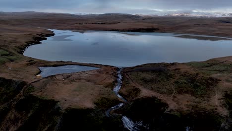 Scenic-View-Of-Systrafoss-Waterfall-And-Systravatn-Lake-In-South-Iceland---Drone-Shot