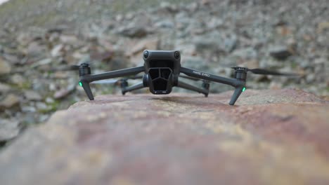 DJI-Mavic-3-Pro-Taking-Off-From-Rock-Boulder-In-Valmalenco