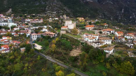 Kruja-in-Albania,-Heritage-Museum,-Castle-Crowns-the-Rocky-Mountain-Slope-Amidst-Modern-City-Structures
