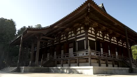 View-Of-Kondo-Hall-On-Sunny-Afternoon-With-Woman-Walking-Past-In-Koyasan