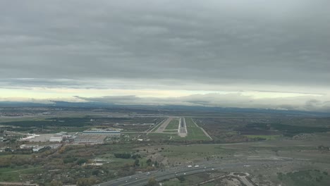 A-runway-·32R-ahead-as-seen-by-the-pilots-arriving-to-the-airport-in-a-cold-winter-day