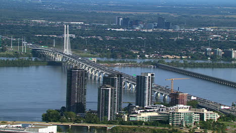 Champlain-Cable-Bridge-over-Saint-Lawrence-River-in-Brossard,-Quebec,-Aerial