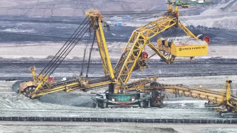 Enormous-bucket-wheel-excavator-in-large-scale-open-pit-mining-operation