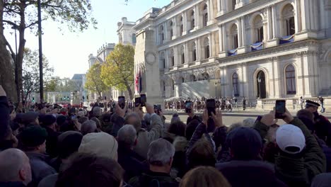 People-gather-at-the-Cenotaph-on-Armistice-Day-in-London,-UK