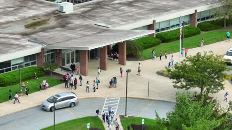 Parents-picking-up-elementary-school-students-after-school-in-USA