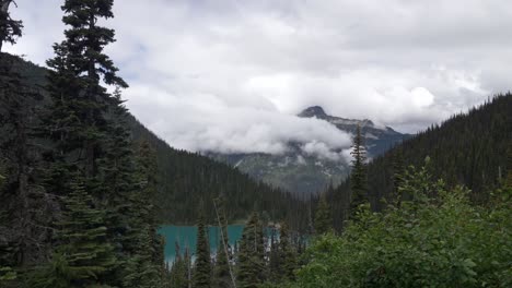 Pemberton,-British-Columbia,-Canada---A-Landscape-Featuring-Joffre-Lake-Embraced-by-Abundant-Green-Foliage---Aerial-Drone-Shot