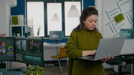 Employee-looking-at-camera-smiling-standing-in-front-of-camera