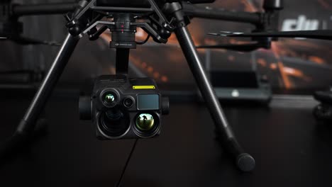 Close-up-of-thermal-camera-and-laser-rangefinder-mounted-on-industrial-drone