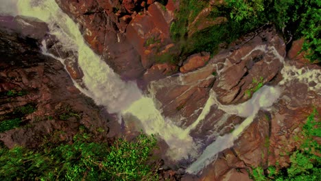 Aerial-view-of-majestic-Bijagual-Waterfall,-the-tallest-waterfall-in-Costa-Rica
