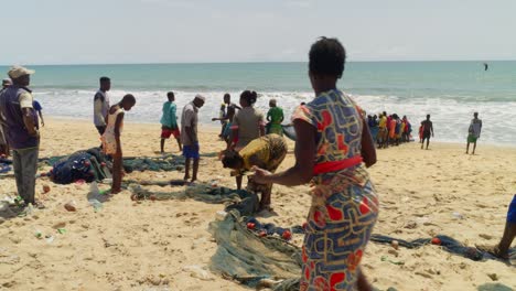 Villagers-from-a-fishing-town-picking-up-fishing-nets