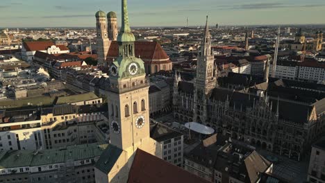 City-buildings-of-impressive-architecture,-towers-with-clocks,-aerial