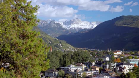 View-across-Bozen---Bolzano-towards-Mount-Tschafon-and-the-Rosengarten-massif,-South-Tyrol,-Italy-in-autumn