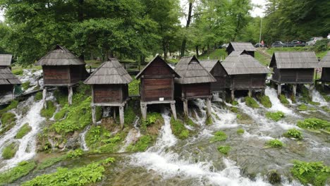Aerial-slide-Jajce-watermills-in-Bosnia-and-Herzegovina,-medieval-architecture