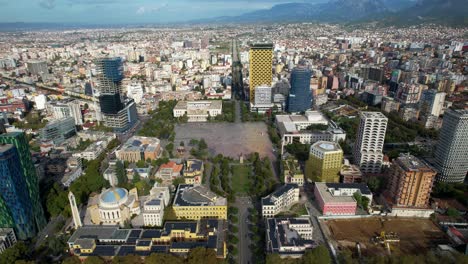 Tirana-in-Autumn,-the-Capital's-Center,-Showcasing-Beautiful-Architecture,-Vast-Squares,-and-Lively-Boulevards