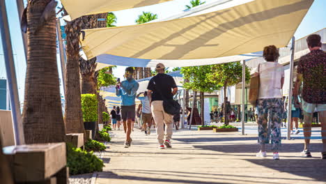 Time-lapse-people-walk-La-Rambla-street-in-Malaga,-Spain-during-summer-day