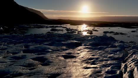 Flying-Over-Skaftafellsjokull-Glacier-At-Sunset-In-South-Iceland---Drone-Shot