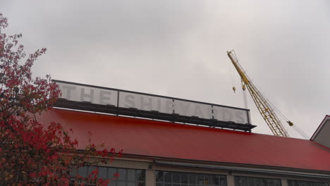 A-sweeping-left-to-right-pan-capturing-the-'The-Shipyards'-sign-nestled-within-North-Vancouver