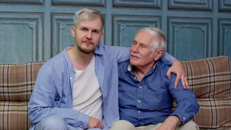 Happy-different-male-generations-family-of-senior-father-and-adult-son-or-grandson-showing-thumbs-up