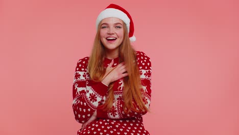 Lovely-positive-adult-girl-in-Christmas-sweater-laughing-out-loud-after-hearing-anecdote,-funny-joke