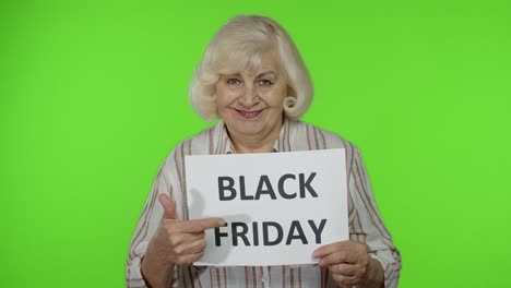 Abuela-Anciana-Sosteniendo-Un-Cartel-De-Inscripción-De-Texto-De-Viernes-Negro.-Mujer-Mayor-Regocijándose-Descuentos