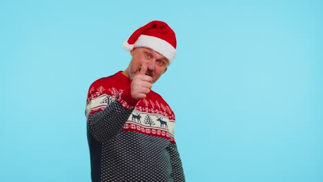 Funny-man-wears-red-New-Year-sweater-with-deers-raises-thumbs-up-agrees-with-something-good,-like