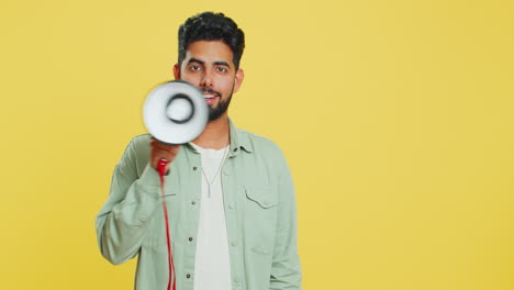 Indian-man-talking-with-megaphone,-proclaiming-news,-loudly-announcing-advertisement-discounts-sale