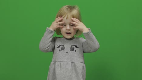 Kid-girl-on-a-Green-Screen,-Chroma-Key.-Happy-three-years-old-girl