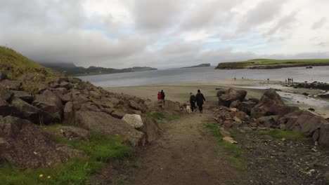 Walking-down-to-the-lake-in-Iceland-with-cloudy-skies