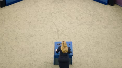 Top-shot-of-female-member-of-the-European-Parliament-speeching-in-the-EU-hemicycle-in-Strasbourg,-France