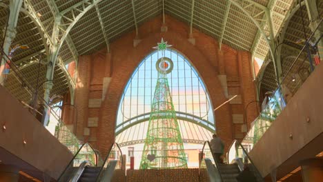 Christmas-Tree-Decor-Inside-The-Market-Building-Of-Mercado-De-Colón-In-Valencia,-Spain