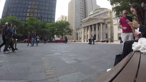 fast-motion-on-music-square-in-front-of-notredame-basilica-in-Montreal,-Canada