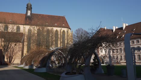 Panoramic-view-of-medieval-architecural-buildings-with-modern-park-in-Colmar,-France